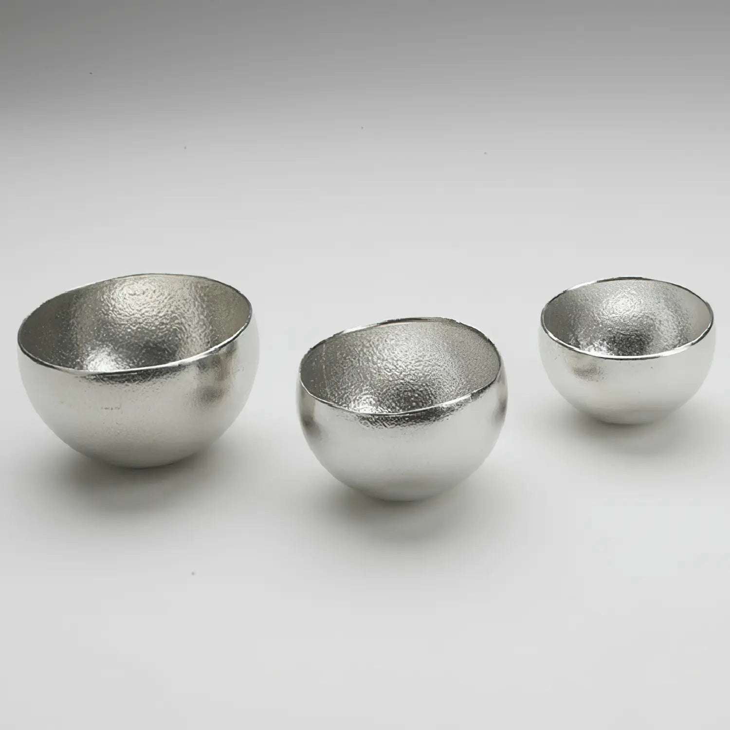 Nousaku Hand-Crafted Cast Tinware Kuzushi Yure Misshapen Swing Cold Sake Cup 40ml - Silver - YOYO JAPAN