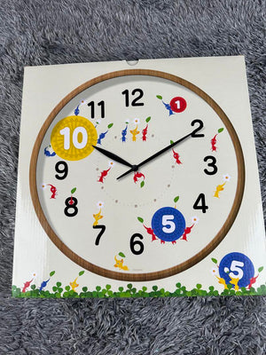 Close-up of Nintendo Pikmin Clock, 33cm, featuring colorful Pikmin for decor