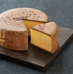 Slice of moist Ginnomori Maman Castella Honey Cake with soft crumb, designed for gentle enjoyment