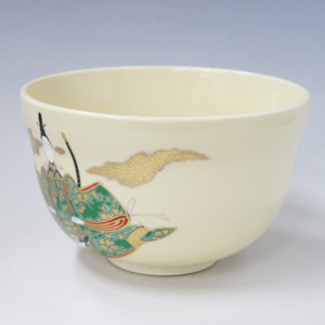 Side view of the chawan white matcha bowl with delicate doll illustration