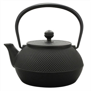 Iwachu Tetsubin Arare Patterned Cast Iron Kettle 0.9 L full view on kitchen counter