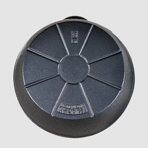 Iwachu cast-iron kettle 0.9 L on IH cooktop in modern kitchen setting