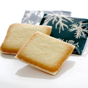 Close-up of Ishiya Shiroi Koibito Cookies White Chocolate 24 Biscuits, featuring langue de chat for melt-in-mouth delight