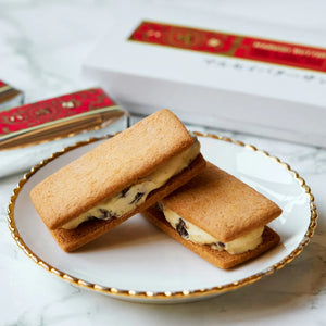 10 Pieces Rokkatei Marusei Butter Sandwich Cookies with cinnamon accents, offering balanced sweetness for dessert lovers