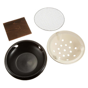 Close-up of Asahisunred Ceramic Charcoal Konro Grill, 21cm, featuring removable trivet for easy cleaning