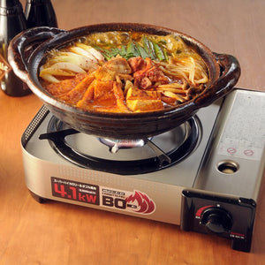 4.1kW Iwatani Cassette Fu Bo Plus Japanese Cassette Stove with carrying case, offering portability for outdoor enthusiasts