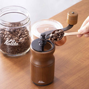 Close-up of Kalita KH-10 #42169 Antique Coffee Grinder, adjustable lid, featuring precise grind control for fresh brews