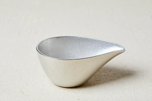 Close-up of Nousaku Tinware Katakuchi Lipped Sake Server, 150ml - Silver, featuring katakuchi spout for drip-free use