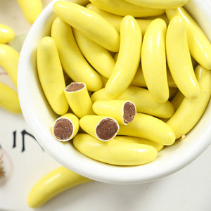 Close-up of Meiji Banana Choco Banana Flavor Chocolate Snack, 37g, featuring creamy chocolate filling