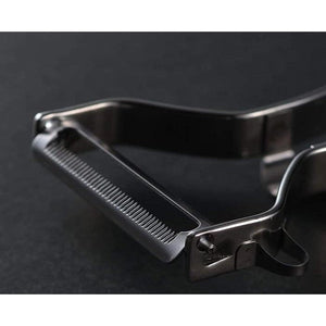 Close-up of Shimomura Tomato Peeler, featuring professional serrated blade for clean peeling