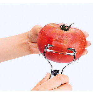 Durable stainless steel Shimomura Tomato Peeler offering precise peeling for home and professional cooks