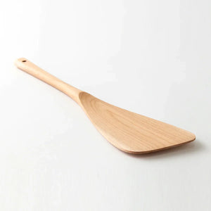Close-up of Umezawa Natural Uncoated Cherry Wood Turner 310mm featuring smooth wood for gentle cooking