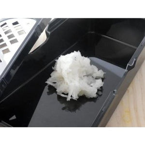 Close-up of Wada Shoten Pro Oroshi X Grater, showcasing stainless-steel surface for smooth, consistent vegetable grating