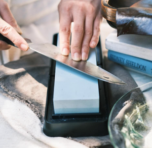 6.5″ Kai AE5200 Santoku Knife with Damascus blade, ideal for slicing vegetables and meats