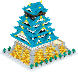 Close-up of Osaka Castle Deluxe Edition Nanoblock, 2430 pieces, featuring stone wall replication for precision assembly