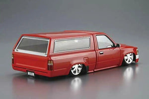 Close-up of Aoshima 1/24 Yn86 Hilux Old School '95 Toyota, featuring realistic suspension for authentic assembly