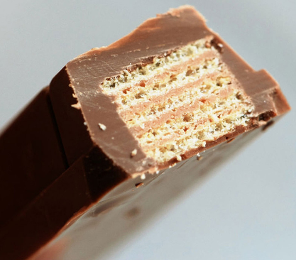 7-bar pack of Nestlé Japanese Kit Kat Chocolate Orange Flavor, combining chocolate and orange for a refreshing snack.