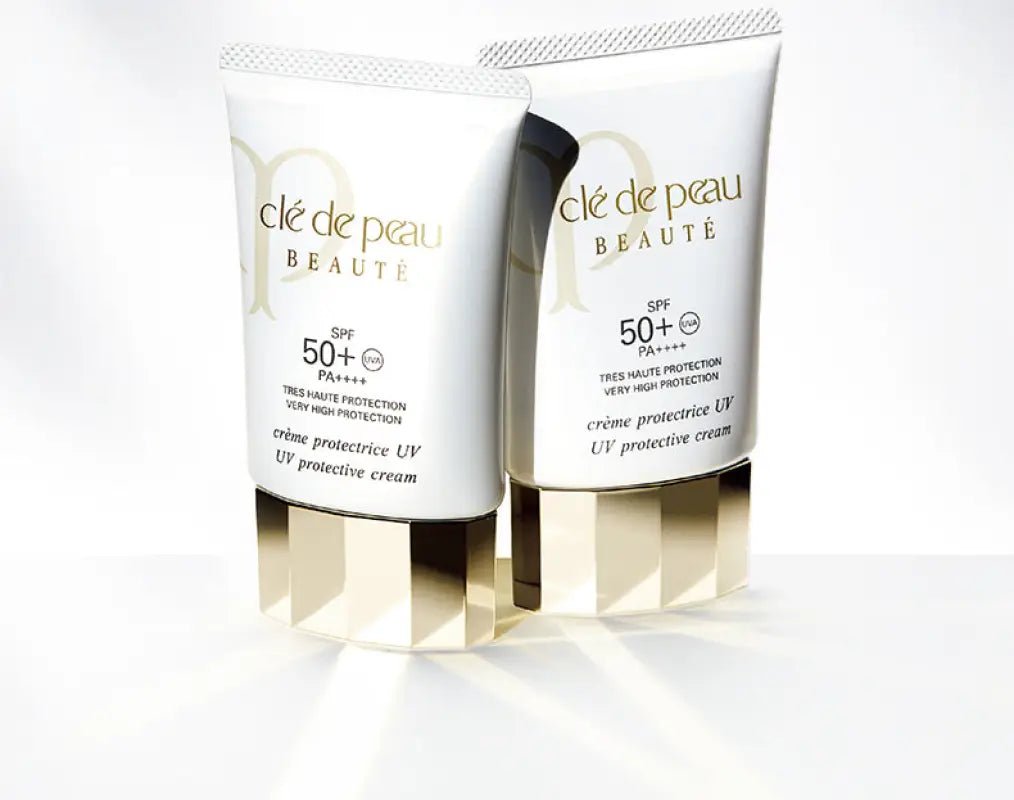 Close-up of Cle de Peau Beaute Claim UV, 50g, featuring non-greasy texture for hydration