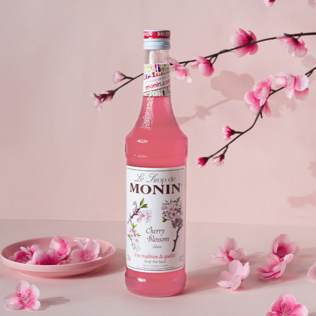 700ml Monin Sakura Syrup with cherry blossom flavor, offering a Japan-inspired taste