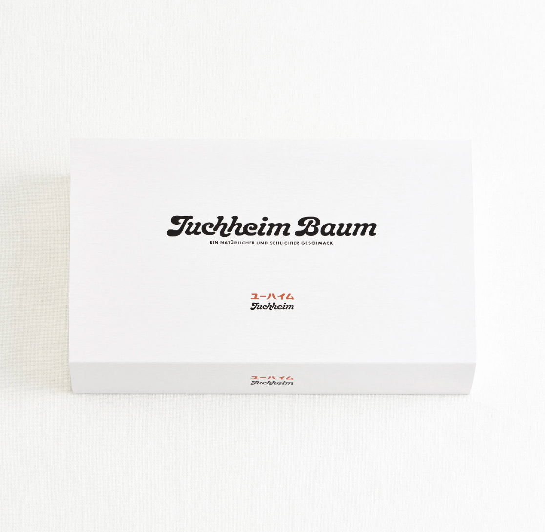 Juchheim Baum Set Plain & Chocolate 29, two-piece Baumkuchen set, ideal for gifting and tea time enjoyment.