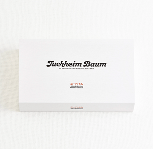 Close-up of Juchheim Baum Set Plain & Chocolate 29 showing layered texture for soft, satisfying bites.