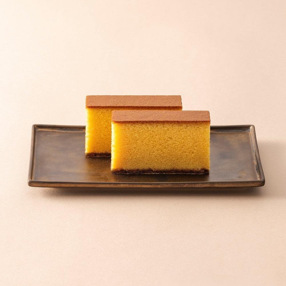 1 Piece Shooken Nagasaki Original Flavor Castella Sponge Cake, golden sponge texture, offering authentic Japanese sweetness
