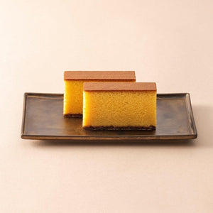1 Piece Shooken Nagasaki Original Flavor Castella Sponge Cake, golden sponge texture, offering authentic Japanese sweetness