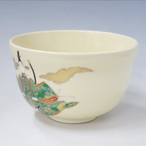 Close-up of Ningyo doll design on white chawan matcha cup