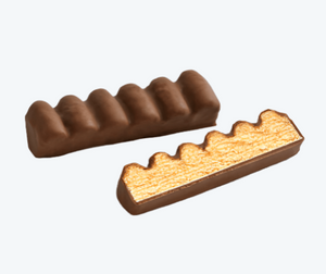 Close-up of a Baum Baton 09 stick showing layered baumkuchen inside