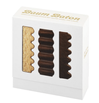 One Baum Baton 09 stick half-eaten to show soft, moist cake texture