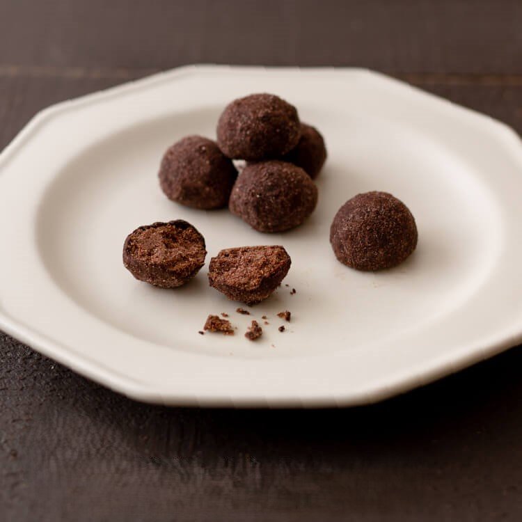 Tatatado Vegan Gluten-Free Cacao Cookie Balls, perfect for enjoying on-the-go or during coffee breaks.