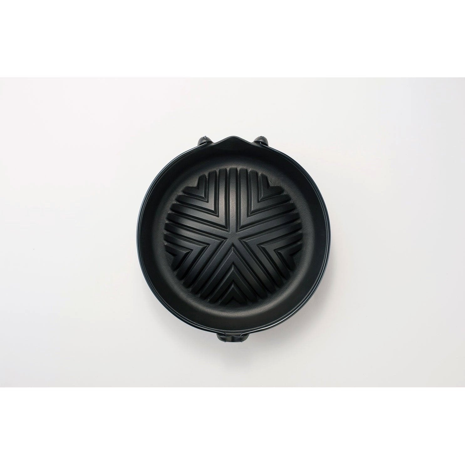 Close-up of Iwachu Cast Iron Jingisukan Grill Pot 23006 showing dome shape for even heat and fat drainage