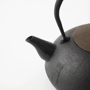 Iwachu Tetsubin Cast Iron Kettle 1.3L, elegant black finish, perfect for authentic Japanese tea ceremonies