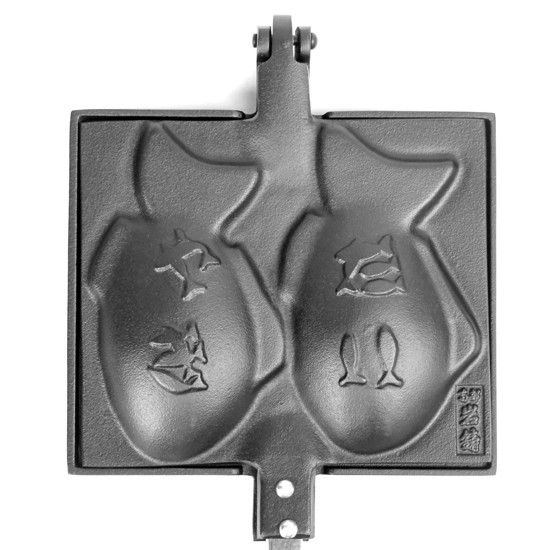 Close-up of Iwachu Nambu Japanese Cast Iron Taiyaki Maker 24030 featuring fish-shaped design for even cooking.