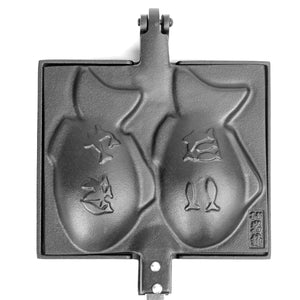 Close-up of Iwachu Nambu Japanese Cast Iron Taiyaki Maker 24030 featuring fish-shaped design for even cooking.
