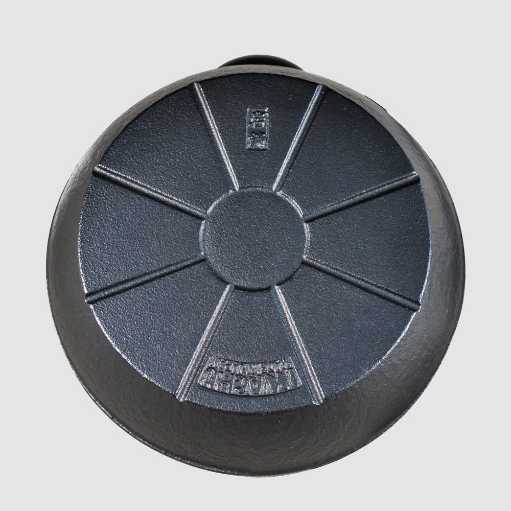 Iwachu cast-iron kettle 0.9 L on IH cooktop in modern kitchen setting