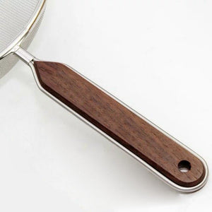 Close-up of 180mm Fine Mesh Strainer, wooden handle, designed for smooth sifting