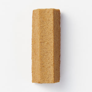 Close-up of Muji Chestnut Baumkuchen, 86g, featuring tree-ring layers for authentic taste