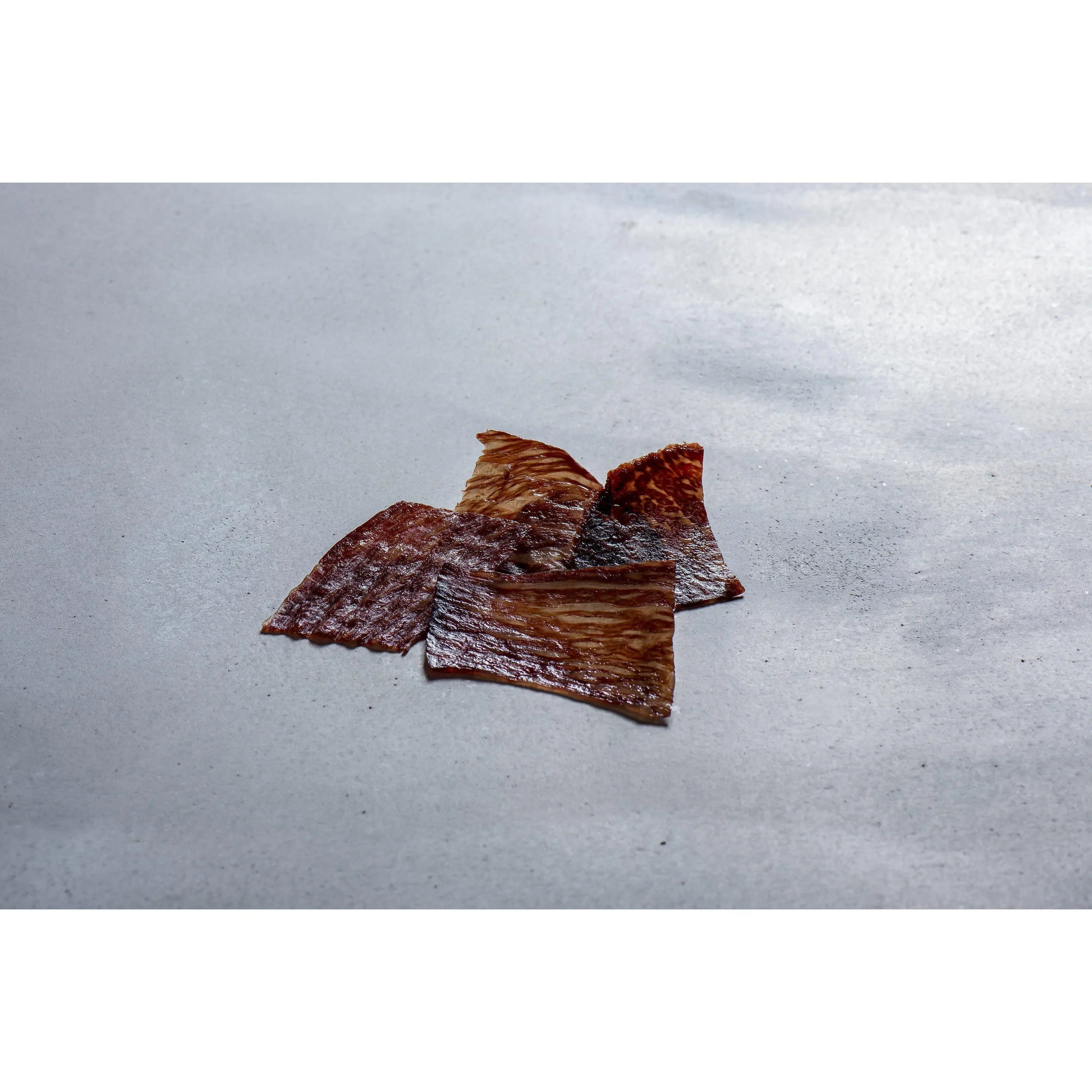Close-up of Nick Wagyu Beef Jerky Japanese Kobe Beef Jerky (Pack of 3), rich umami flavor for satisfying treats