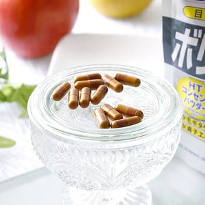 Close-up of DHC Volume Top Vitamin Supplement (30-Day Supply), featuring nutrient capsules for resilience