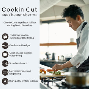 Close-up of Asahi Cookin' Cut Japan Rubber Cutting Board, 380x210x13mm, featuring synthetic rubber for durability