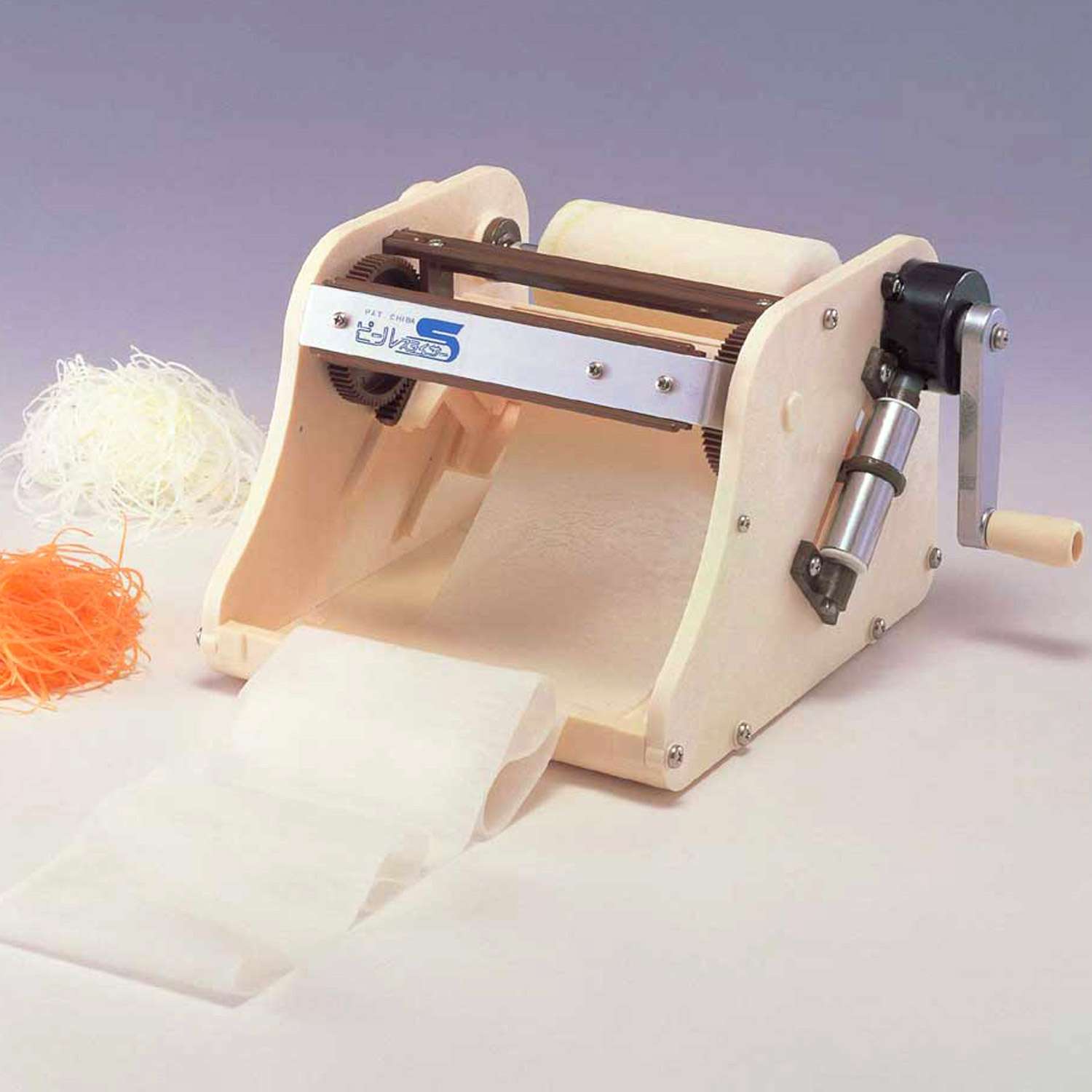 S size Chiba Plastic Katsuramuki Peeler S Turning Slicer with rust-resistant plastic, offering safe slicing for culinary artists