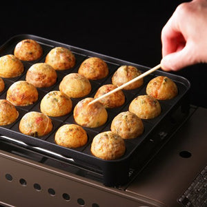 Close-up of Iwatani Cassette Gas Takoyaki Maker Japan Super Flame Octopus (Entako) Cb-Etk-1, 16 holes, featuring non-stick coating for easy flipping