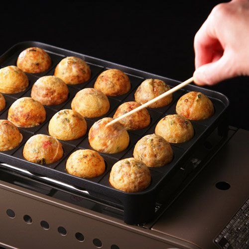 Close-up of Iwatani Cassette Gas Takoyaki Maker Japan Super Flame Octopus (Entako) Cb-Etk-1, 16 holes, featuring non-stick coating for easy flipping