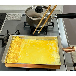 Close-up of Marushin Copper Tamagoyaki Pan Kansai Type Japanese Omelette Pan 21cm, featuring even heat distribution for precise layering