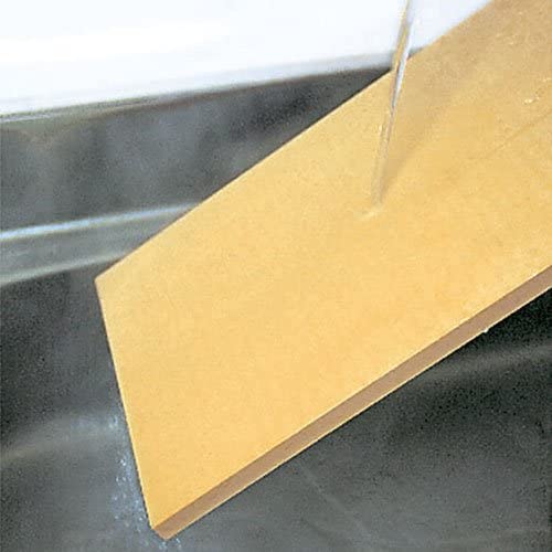 Close-up of Parker Asahi Japan Cookin' Cut Synthetic Rubber Cutting Board, 500mm x 330mm x 30mm, featuring durable rubber for hygiene