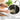 Close-up of River Lite JAPAN J1428 Iron Frying Pan, 28cm, featuring a natural wood handle for a comfortable grip