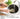 Close-up of River Lite JAPAN J1428 Iron Frying Pan, 28cm, featuring a natural wood handle for a comfortable grip