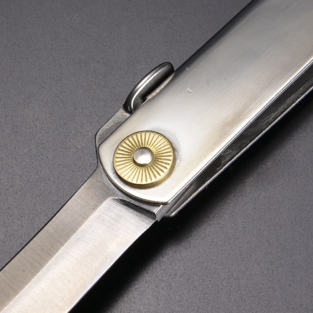 Close-up of Higonokami VG10 Folding Knife 170mm, featuring brass handle for durability