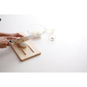 KAI Seki Magoroku Aofuzi Santoku Knife 165mm displayed on wooden cutting board, perfect for vegetable slicing